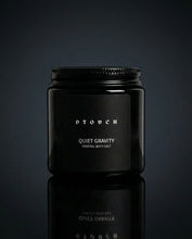 Load image into Gallery viewer, Black container of 'Quiet Gravity' bath salts by 'ptouch' on a dark background
